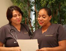 Star Clinic staff reviewing document